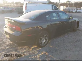 2013 Dodge Charger RT with VIN 2C3CDXCT4DH696609, listed as a IAAI auction lot 41989773 with 118,148 mi miles. Bid and sale history available at carsss.com. Image 4.