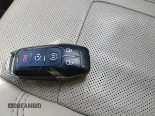 2014 Lincoln MKZ z VIN 3LN6L2GKXER809691, wystawiony jako IAAI lot #41588488 z przebiegiem 163 552 mil mil oraz . Historia ofert i sprzedaży dostępna na DreamBid. Obrazek 11.