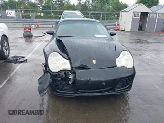 2005 Porsche 911 Carrera z VIN WP0CA299X5S650179, wystawiony jako IAAI lot #42123937 z przebiegiem 52 437 mil mil oraz . Historia ofert i sprzedaży dostępna na DreamBid. Obrazek 6.