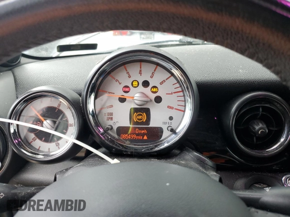 2014 MINI Convertible S with VIN WMWZP3C53ET298154, listed as a Copart auction lot 53971615 with 85,499 mi miles and Salvage title. Bid and sale history available at DreamBid. Image 9.