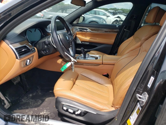 2016 BMW 7 Series 750i xDrive with VIN WBA7F2C5XGG418225, listed as a Copart auction lot 54860623 with 76,980 mi miles and . Bid and sale history available at DreamBid. Image 7.