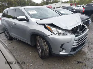 2018 Toyota Highlander SE with VIN 5TDKZRFH2JS538634, listed as a IAAI auction lot 41920012 with 114,417 mi miles and . Bid and sale history available at DreamBid. Image 1.
