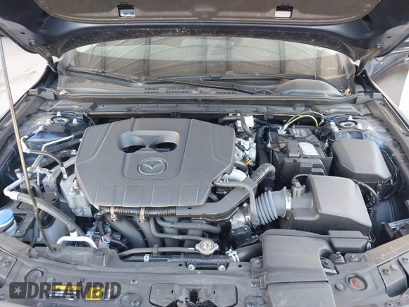 2024 Mazda 3 S with VIN 3MZBPAAM4RM423330, listed as a IAAI auction lot 41582454 with 12,604 mi miles and . Bid and sale history available at DreamBid. Image 10.