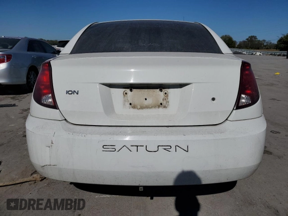 2003 Saturn ION ION 1 z VIN 1G8AF52F83Z151812, wystawiony jako Copart lot #77000594 z przebiegiem 313 620 mil mil oraz Szkoda całkowita • Salvage title. Historia ofert i sprzedaży dostępna na DreamBid. Obrazek 6.