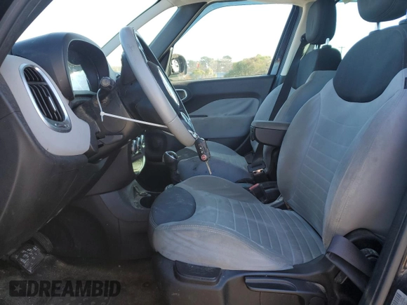 2014 FIAT 500L Easy with VIN ZFBCFABH6EZ002104, listed as a Copart auction lot 83943314 with 91,571 mi miles and Salvage Title. Bid and sale history available at DreamBid. Image 7.