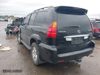 2005 Lexus GX 470 with VIN JTJBT20X150084634, listed as a IAAI auction lot 41461071 with 180,387 mi miles. Bid and sale history available at carsss.com. Image 3.