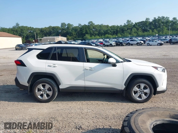 2019 Toyota RAV4 XLE with VIN JTMP1RFV0KD020442, listed as a IAAI auction lot 40108049 with 70,916 mi miles and . Bid and sale history available at DreamBid. Image 13.