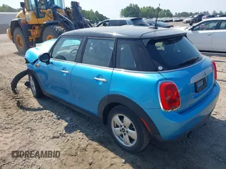 2015 MINI Hardtop 4 Door with VIN WMWXS5C56FT831505, listed as a IAAI auction lot 42155398 with 95,693 mi miles and . Bid and sale history available at DreamBid. Image 3.
