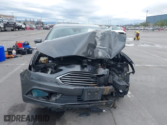 2018 Ford Fusion SE z VIN 3FA6P0LU8JR195096, wystawiony jako IAAI lot #41494088 z przebiegiem 114 007 mil mil oraz . Historia ofert i sprzedaży dostępna na DreamBid. Obrazek 13.