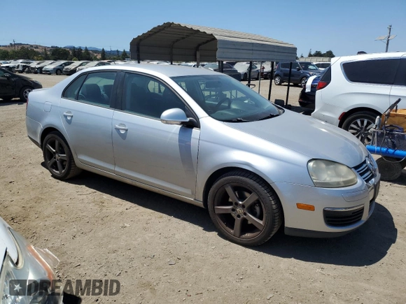 2009 Volkswagen Jetta S with VIN 3VWJZ71K39M149271, listed as a Copart auction lot 64703065 with 214,011 mi miles and Clean title. Bid and sale history available at DreamBid. Image 4.