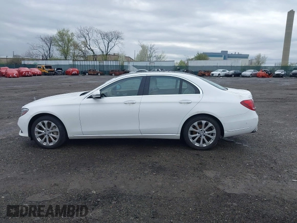 2017 Mercedes-Benz E E 300 Luxury with VIN WDDZF4KBXHA108620, listed as a IAAI auction lot 41935260 with 81,684 mi miles. Bid and sale history available at carsss.com. Image 14.