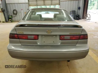 1998 Toyota Camry LE с VIN 4T1BG22K6WU356495, выставлен на аукционе Copart как лот 55639765 с пробегом Не указан миль и Списание • Salvage title. История ставок и продаж доступна на DreamBid. Изображение 6.