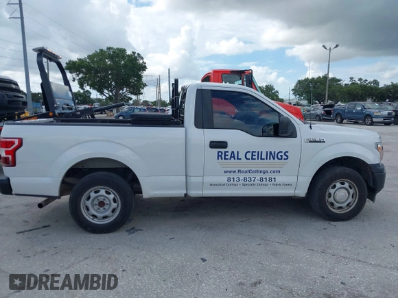 2018 Ford F-150 XL with VIN 1FTMF1CB0JFE21234, listed as a IAAI auction lot 42605399 with 243,035 mi miles and . Bid and sale history available at DreamBid. Image 13.