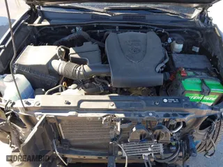 2019 Toyota Tacoma 4WD SR with VIN 3TMCZ5AN9KM275537, listed as a IAAI auction lot 41694037 with 102,933 mi miles. Bid and sale history available at carsss.com. Image 10.