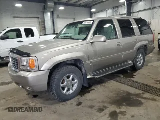 2000 Cadillac Escalade z VIN 1GYEK63R2YR183271, wystawiony jako Copart lot #46654985 z przebiegiem 112 080 mil mil oraz Szkoda całkowita • Salvage title. Historia ofert i sprzedaży dostępna na DreamBid. Obrazek 1.
