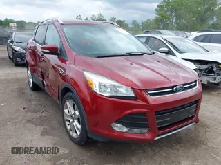 2015 Ford Escape Titanium with VIN 1FMCU0J92FUB71084, listed as a IAAI auction lot 42450143 with 134,105 mi miles and . Bid and sale history available at DreamBid. Image 1.