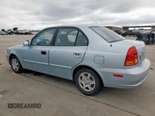 2003 Hyundai Accent GL z VIN KMHCG45C73U481294, wystawiony jako Copart lot #55958005 z przebiegiem 136 964 mil mil oraz Czysty tytuł • Clean title. Historia ofert i sprzedaży dostępna na DreamBid. Obrazek 2.