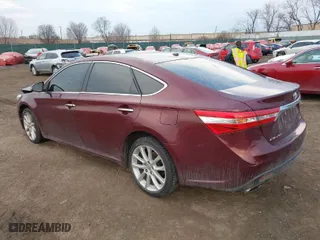 2013 Toyota Avalon XLE with VIN 4T1BK1EB4DU029014, listed as a IAAI auction lot 41689404 with 130,297 mi miles. Bid and sale history available at carsss.com. Image 3.