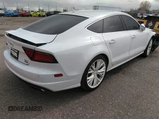 2016 Audi A7 3.0 Premium Plus with VIN WAUWGAFC6GN144188, listed as a IAAI auction lot 41824927 with 128,379 mi miles. Bid and sale history available at carsss.com. Image 4.