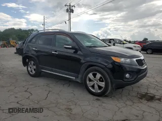 2012 Kia Sorento EX z VIN 5XYKU4A26CG252144, wystawiony jako Copart lot #56290995 z przebiegiem 220 802 mil mil oraz Szkoda całkowita • Salvage title. Historia ofert i sprzedaży dostępna na DreamBid. Obrazek 4.