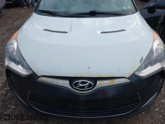 2012 Hyundai Veloster w/Black Int with VIN KMHTC6AD6CU020657, listed as a IAAI auction lot 42031670 with 187,585 mi miles and . Bid and sale history available at DreamBid. Image 6.