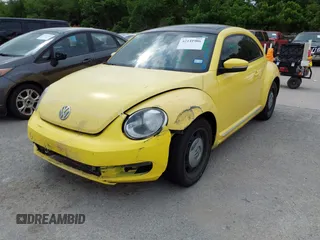 2013 Volkswagen Beetle 2.5L w/Sun/Sound/Nav with VIN 3VWJX7AT2DM680808, listed as a IAAI auction lot 42141906 with 113,399 mi miles and . Bid and sale history available at DreamBid. Image 17.