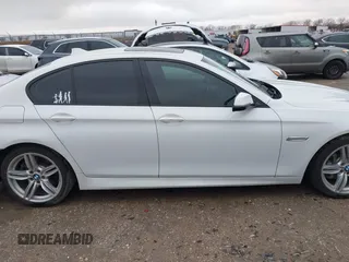 2014 BMW 5 Series 535i with VIN WBA5B1C57ED482119, listed as a IAAI auction lot 41554718 with 188,677 mi miles and . Bid and sale history available at DreamBid. Image 14.