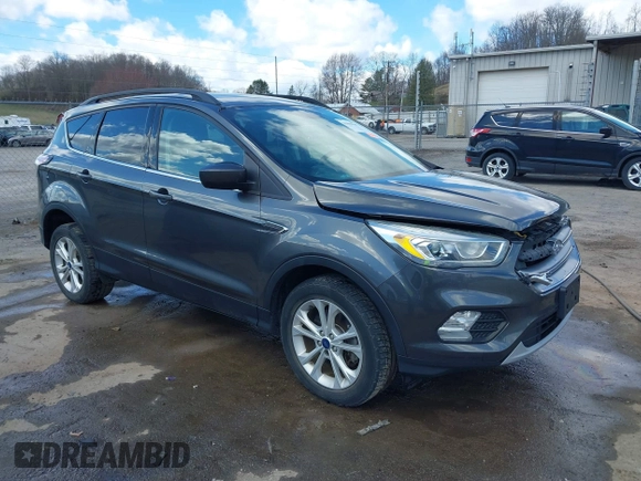 2017 Ford Escape SE with VIN 1FMCU9GDXHUA10453, listed as a IAAI auction lot 41860507 with 175,733 mi miles and . Bid and sale history available at DreamBid. Image 1.
