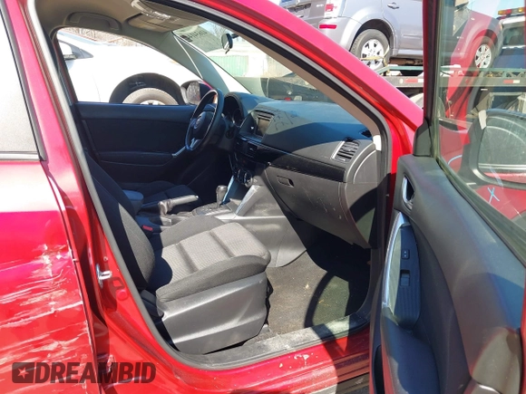 2014 Mazda CX-5 Touring with VIN JM3KE2CY2E0374440, listed as a IAAI auction lot 41634144 with 106,145 mi miles and . Bid and sale history available at DreamBid. Image 5.