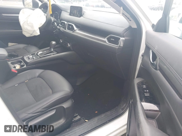 2017 Mazda CX-5 Touring with VIN JM3KFACL5H0189296, listed as a IAAI auction lot 42042328 with 60,208 mi miles and . Bid and sale history available at carsss.com. Image 5.
