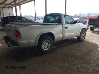 2002 Dodge Dakota z VIN 1B7FL36X42S532446, wystawiony jako IAAI lot #41683398 z przebiegiem 245 626 mil mil oraz . Historia ofert i sprzedaży dostępna na DreamBid. Obrazek 4.