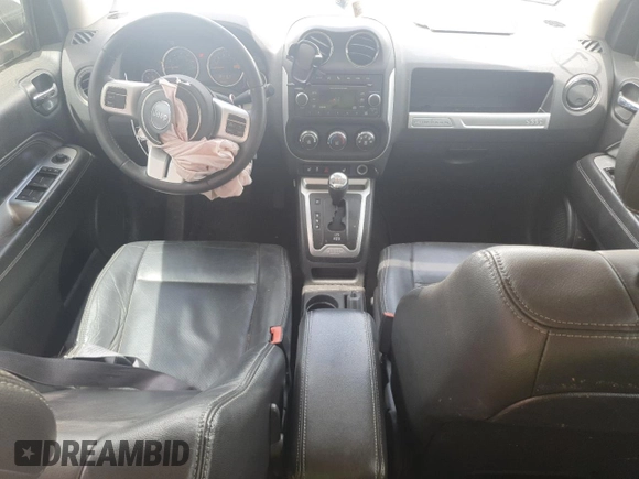 2017 Jeep Compass Latitude z VIN 1C4NJDEB5HD171724, wystawiony jako Copart lot #52525425 z przebiegiem 91 514 mil mil oraz Szkoda całkowita • Salvage title. Historia ofert i sprzedaży dostępna na DreamBid. Obrazek 8.