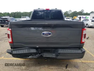 2021 Ford F-150 XL with VIN 1FTFW1ED0MFC98028, listed as a Copart auction lot 56652825 with 100,062 mi miles and Salvage title. Bid and sale history available at DreamBid. Image 6.