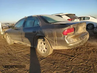 2002 Oldsmobile Intrigue GX z VIN 1G3WH52HX2F253040, wystawiony jako Copart lot #85429974 z przebiegiem 252 469 mil mil oraz Szkoda całkowita • Salvage title. Historia ofert i sprzedaży dostępna na DreamBid. Obrazek 2.