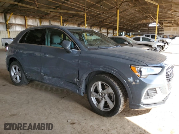2020 Audi Q3 Premium with VIN WA1AECF34L1034797, listed as a Copart auction lot 51096385 with 74,192 mi miles and Salvage title. Bid and sale history available at DreamBid. Image 4.