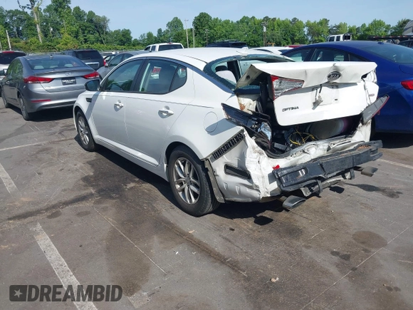 2013 Kia Optima LX z VIN KNAGM4A7XD5374109, wystawiony jako IAAI lot #42209534 z przebiegiem 184 578 mil mil oraz . Historia ofert i sprzedaży dostępna na DreamBid. Obrazek 3.