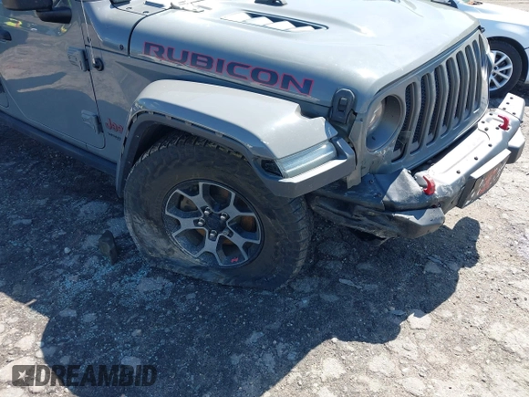 2018 Jeep Wrangler Unlimited Rubicon with VIN 1C4HJXFG6JW267087, listed as a IAAI auction lot 42235058 with 93,962 mi miles and . Bid and sale history available at DreamBid. Image 6.