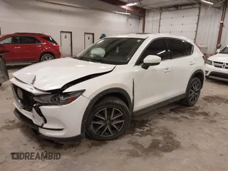 2018 Mazda CX-5 S Premium with VIN JM3KFBDM1J1412088, listed as a IAAI auction lot 41497431 with 65,532 mi miles and . Bid and sale history available at DreamBid. Image 2.
