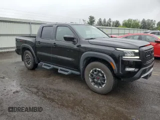 2022 Nissan Frontier Pro-4X z VIN 1N6ED1EK4NN686366, wystawiony jako Copart lot #57396085 z przebiegiem 50 753 mil mil oraz Szkoda całkowita • Salvage title. Historia ofert i sprzedaży dostępna na DreamBid. Obrazek 4.