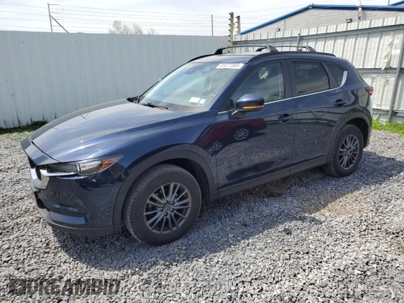 2021 Mazda CX-5 Touring with VIN JM3KFBCM0M0302015, listed as a Copart auction lot 55077305 with 40,558 mi miles and Salvage Title. Bid and sale history available at carsss.com. Image 1.