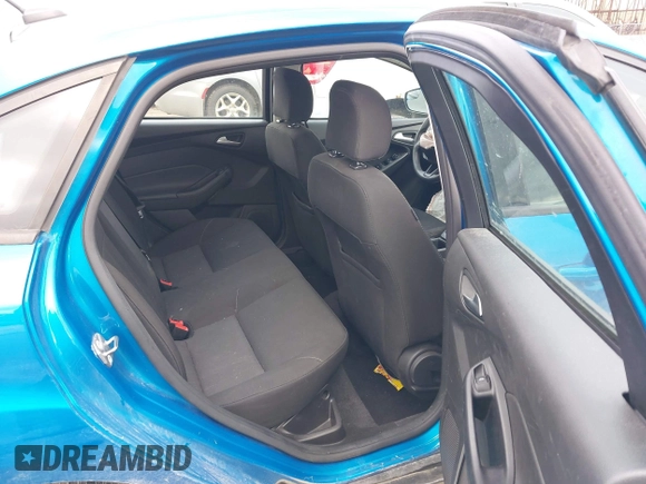 2017 Ford Focus SE with VIN 1FADP3F24HL243981, listed as a IAAI auction lot 40987789 with 56,988 mi miles and . Bid and sale history available at DreamBid. Image 8.