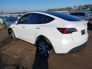 2023 Tesla Model Y Long Range with VIN 7SAYGDEE9PA173277, listed as a IAAI auction lot 41597562 with 22,666 mi miles. Bid and sale history available at carsss.com. Image 3.