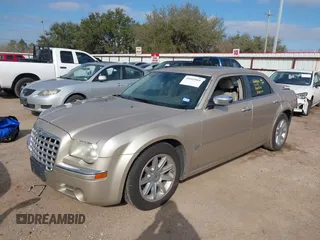 2006 Chrysler 300 C with VIN 2C3KA63HX6H487887, listed as a IAAI auction lot 41603068 with 133,169 mi miles. Bid and sale history available at carsss.com. Image 2.