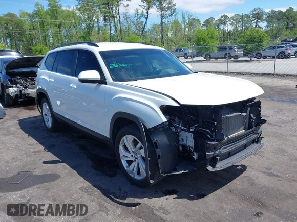 2021 Volkswagen Atlas SE z VIN 1V2WR2CA2MC529355, wystawiony jako IAAI lot #41972048 z przebiegiem 63 970 mil mil oraz . Historia ofert i sprzedaży dostępna na DreamBid. Obrazek 1.