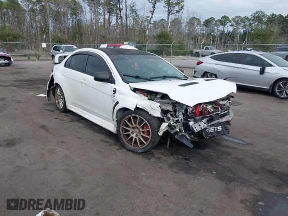 2011 Mitsubishi Lancer Evolution GSR with VIN JA32W8FV9BU045781, listed as a IAAI auction lot 41308314 with 102,840 mi miles. Bid and sale history available at carsss.com. Image 1.