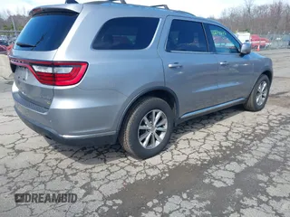 2015 Dodge Durango Limited with VIN 1C4RDJDG6FC202115, listed as a IAAI auction lot 42041272 with 162,755 mi miles. Bid and sale history available at carsss.com. Image 4.