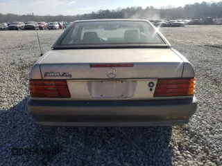 1990 Mercedes-Benz 500 z VIN WDBFA66E8LF010613, wystawiony jako Copart lot #47093275 z przebiegiem 120 814 mil mil oraz Szkody całkowita. Historia ofert i sprzedaży dostępna na DreamBid. Obrazek 6.