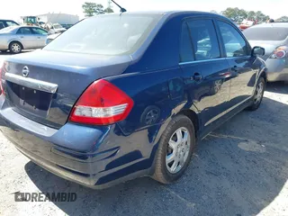2009 Nissan Versa 1.8 S with VIN 3N1BC11E39L378963, listed as a IAAI auction lot 41829690 with 169,531 mi miles. Bid and sale history available at carsss.com. Image 4.