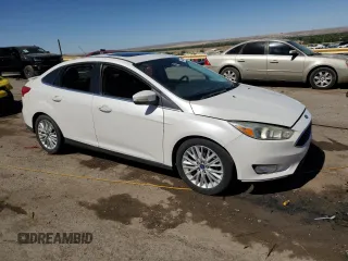2015 Ford Focus Titanium with VIN 1FADP3J23FL300126, listed as a Copart auction lot 54434165 with 176,526 mi miles and Salvage title. Bid and sale history available at DreamBid. Image 4.