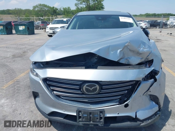 2020 Mazda CX-9 Touring with VIN JM3TCBCY2L0415513, listed as a IAAI auction lot 42481543 with 47,294 mi miles and . Bid and sale history available at DreamBid. Image 12.
